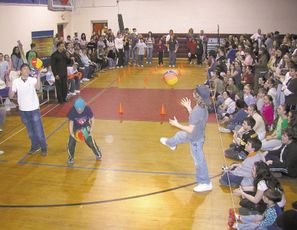 Students attending a winter carnival at Woodbury High School in Salem, N.H., participate in New Hampshire Public Television's LiveFIT NH activities that get them moving.
